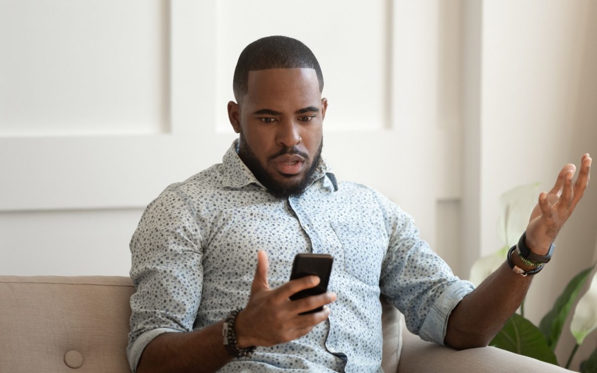 guy looking concerned at phone