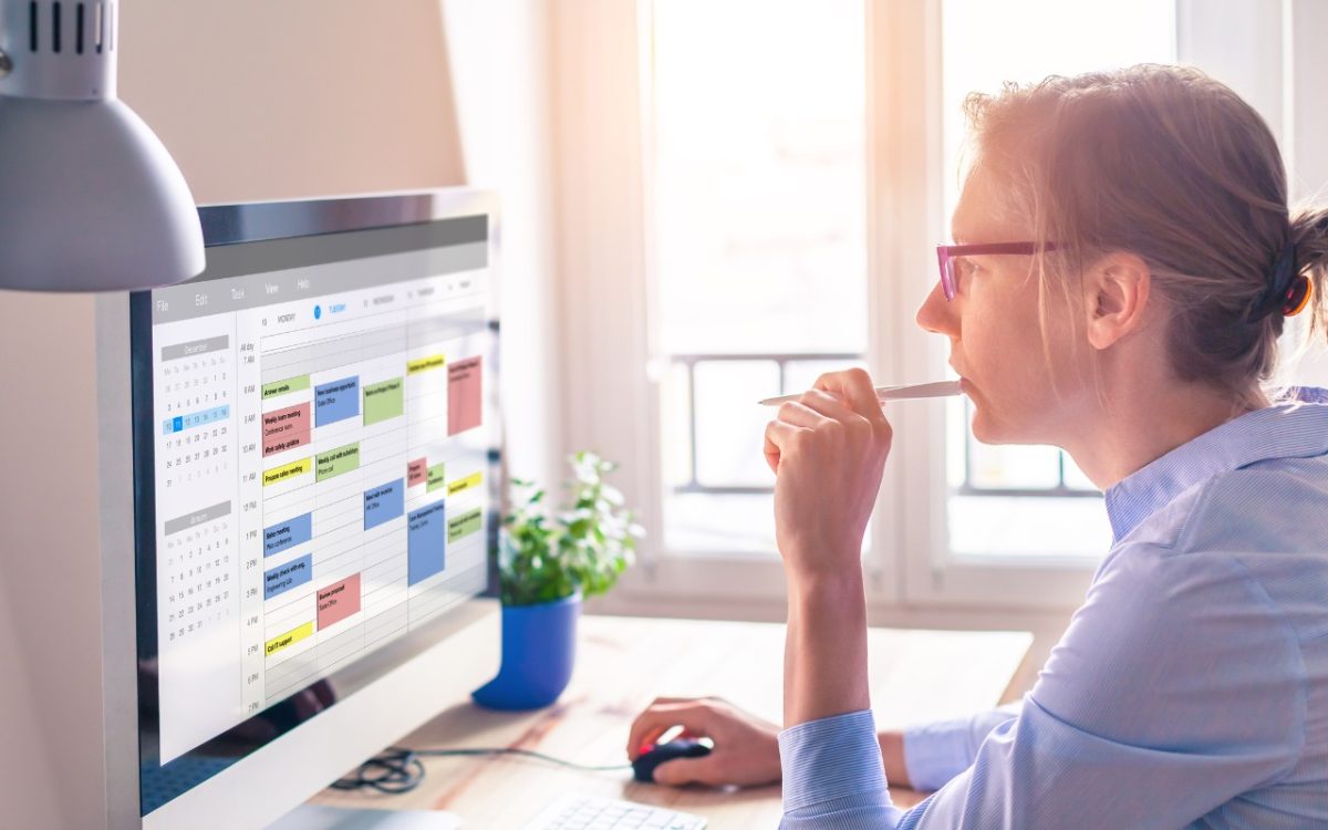 woman looking at computer screen